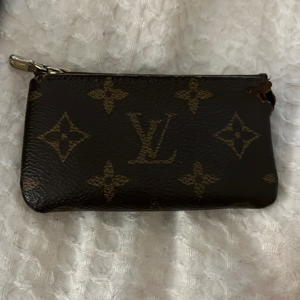 LV wallet. Authentic. Damaged in corner. Good for someone looking for a project